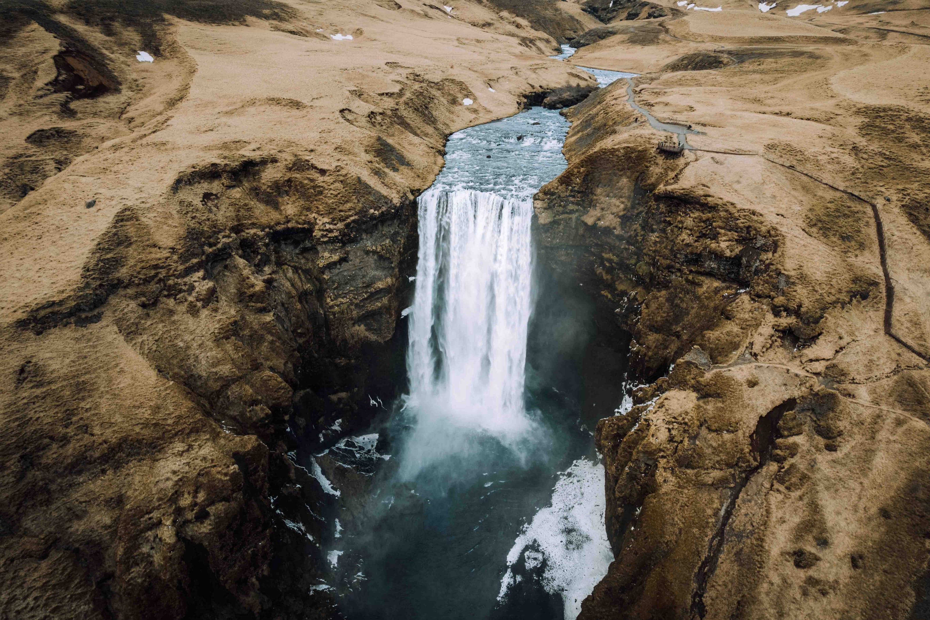 An aerial view of a waterfall in Iceland